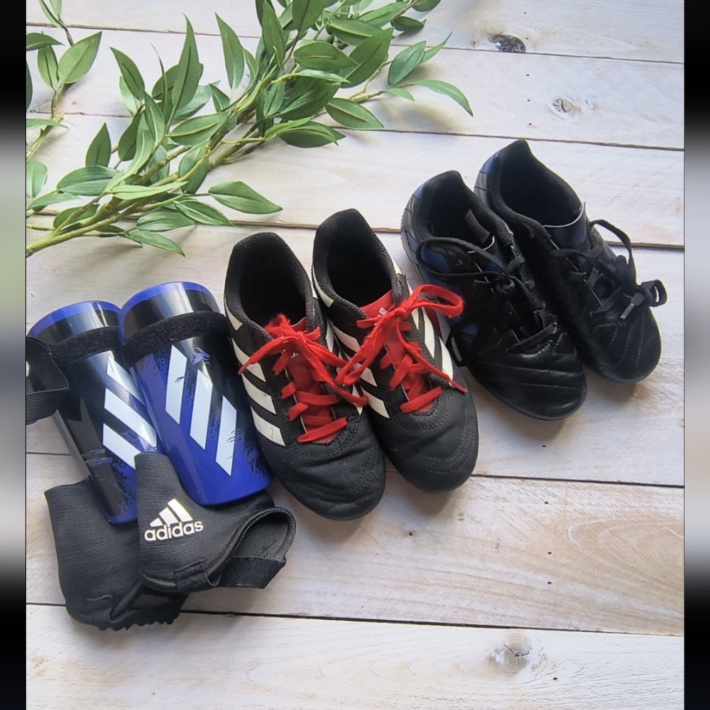 adidas Kids Black Soccer Cleats with Red Laces & Blue Shin Guards